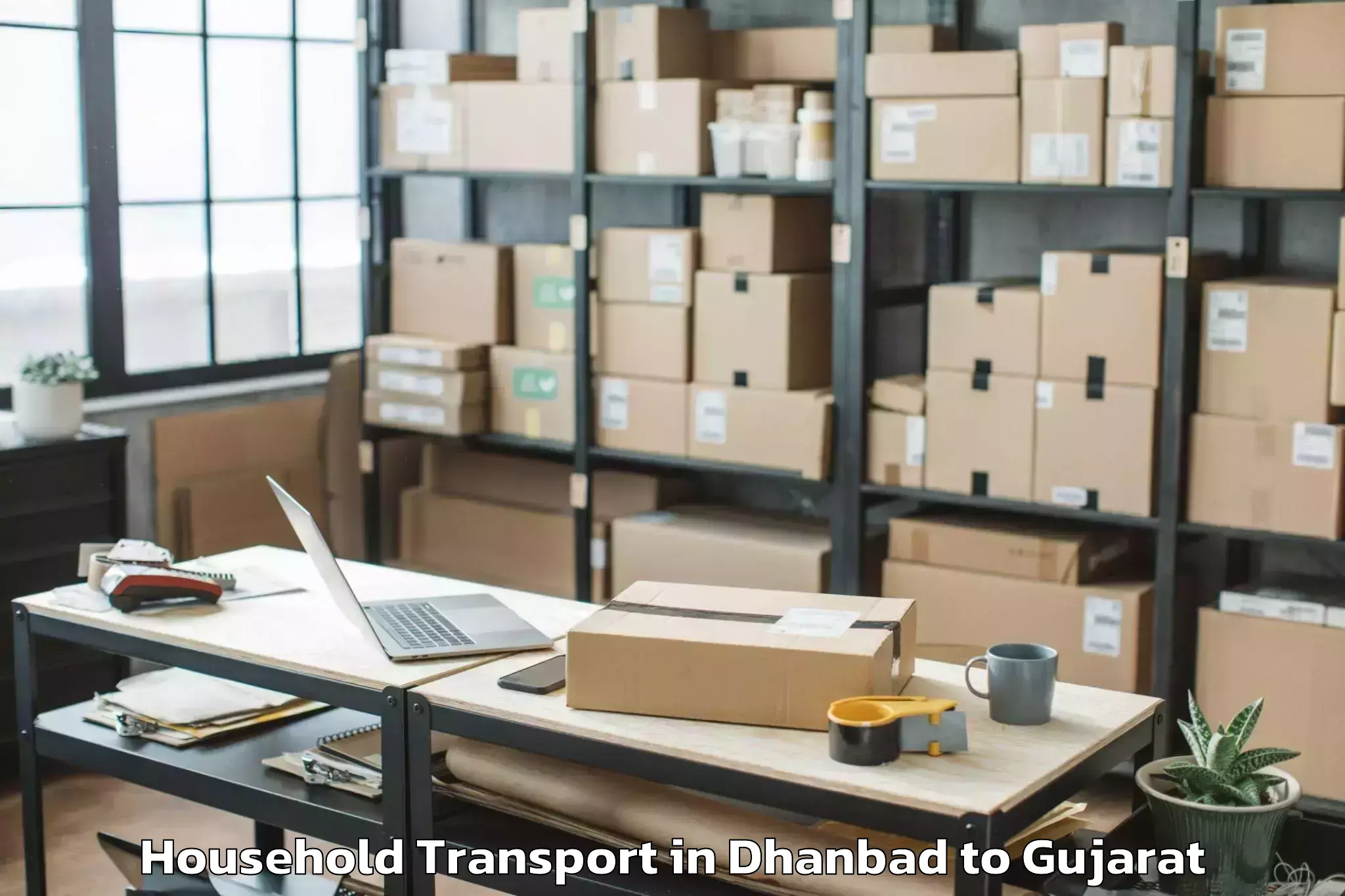 Affordable Dhanbad to Udhana Household Transport